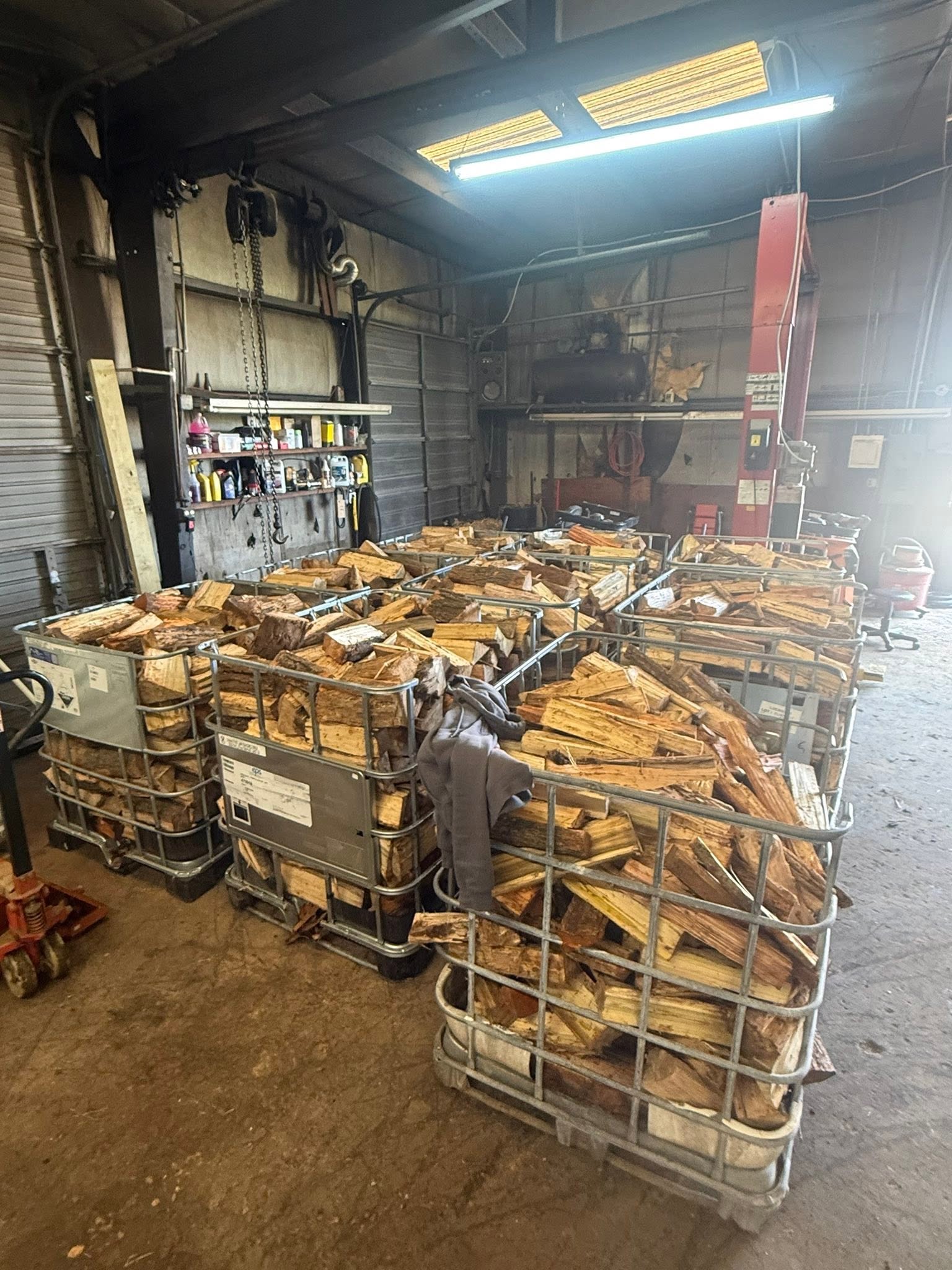 Totes of split hardwood firewood at Wallburg Mulch Worx in High Point NC